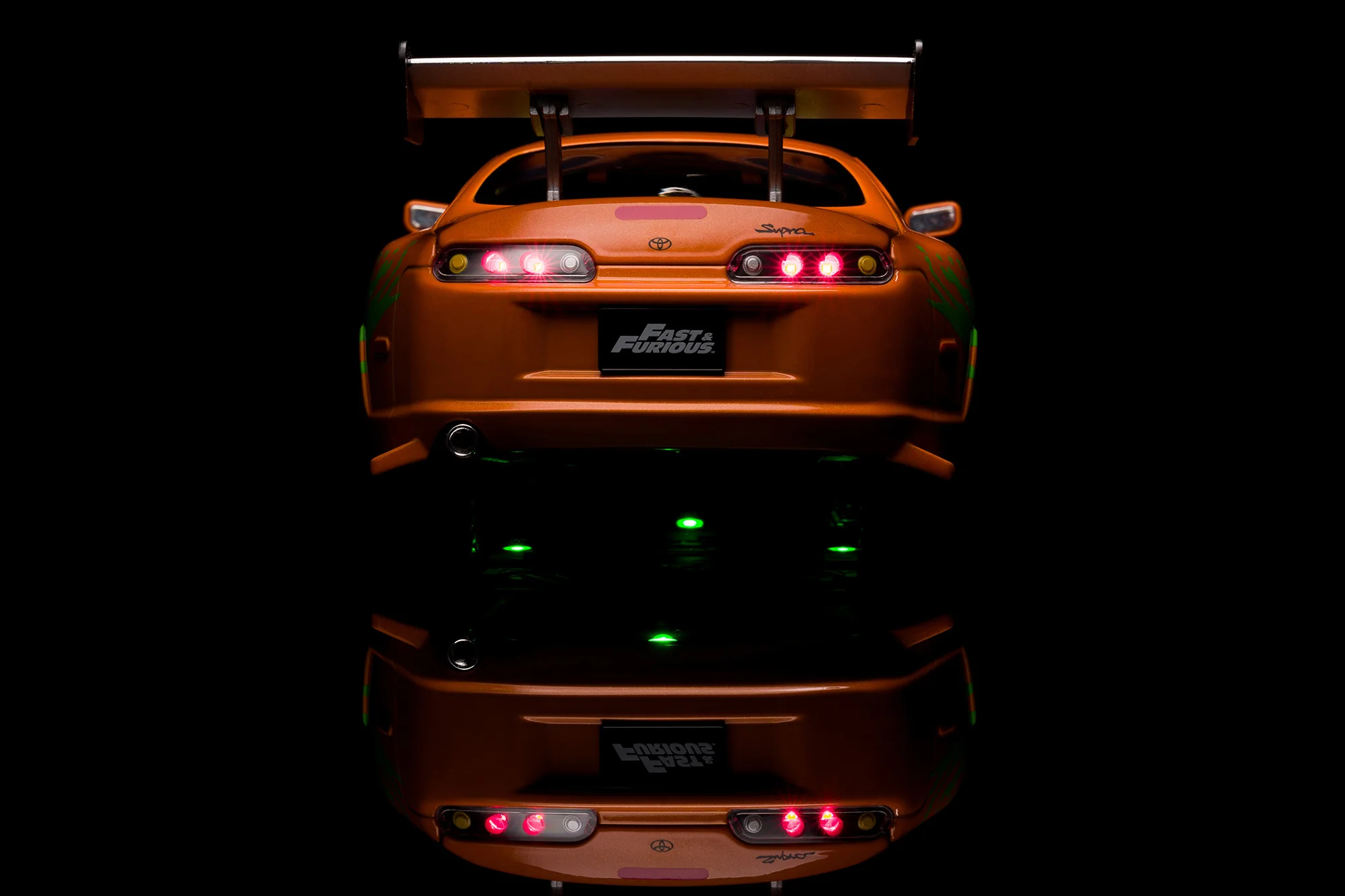 Fast & Furious Brian's Toyota Supra, 1:18 Scale Vehicle w/ Lights & 3.75" Figure - Image 4